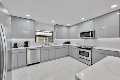 GORGEOUS 3 BEDROOM 2 BATH VILLA WITH ABSOLUTELY NOTHING TO DO on Boca Lago Golf and Country Club in Florida - for sale on GolfHomes.com, golf home, golf lot