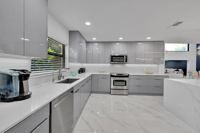 GORGEOUS 3 BEDROOM 2 BATH VILLA WITH ABSOLUTELY NOTHING TO DO on Boca Lago Golf and Country Club in Florida - for sale on GolfHomes.com, golf home, golf lot