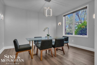 Not a single detail was spared in this sprawling custom brick on St Clair River Country Club in Michigan - for sale on GolfHomes.com, golf home, golf lot