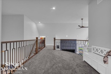 Not a single detail was spared in this sprawling custom brick on St Clair River Country Club in Michigan - for sale on GolfHomes.com, golf home, golf lot