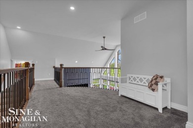 Not a single detail was spared in this sprawling custom brick on St Clair River Country Club in Michigan - for sale on GolfHomes.com, golf home, golf lot