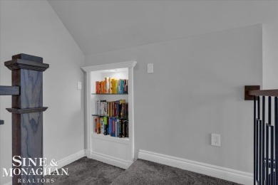Not a single detail was spared in this sprawling custom brick on St Clair River Country Club in Michigan - for sale on GolfHomes.com, golf home, golf lot
