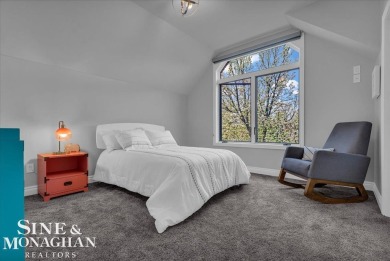 Not a single detail was spared in this sprawling custom brick on St Clair River Country Club in Michigan - for sale on GolfHomes.com, golf home, golf lot