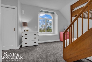 Not a single detail was spared in this sprawling custom brick on St Clair River Country Club in Michigan - for sale on GolfHomes.com, golf home, golf lot