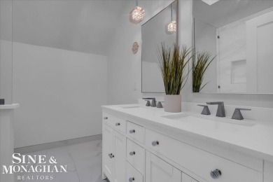 Not a single detail was spared in this sprawling custom brick on St Clair River Country Club in Michigan - for sale on GolfHomes.com, golf home, golf lot