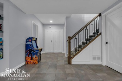 Not a single detail was spared in this sprawling custom brick on St Clair River Country Club in Michigan - for sale on GolfHomes.com, golf home, golf lot