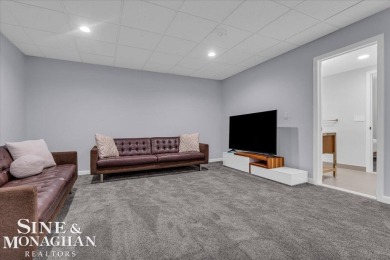 Not a single detail was spared in this sprawling custom brick on St Clair River Country Club in Michigan - for sale on GolfHomes.com, golf home, golf lot