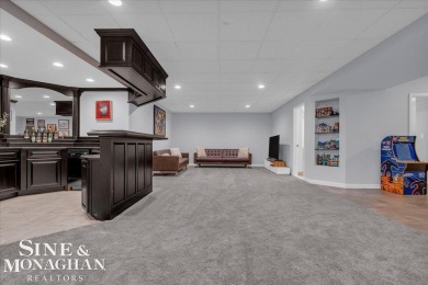 Not a single detail was spared in this sprawling custom brick on St Clair River Country Club in Michigan - for sale on GolfHomes.com, golf home, golf lot
