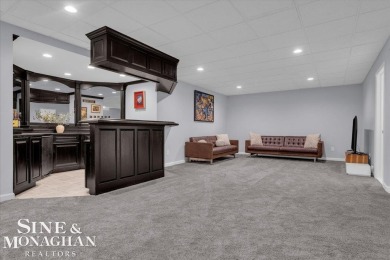 Not a single detail was spared in this sprawling custom brick on St Clair River Country Club in Michigan - for sale on GolfHomes.com, golf home, golf lot