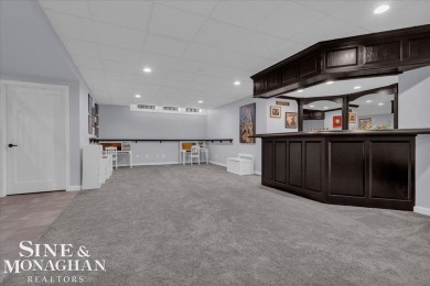 Not a single detail was spared in this sprawling custom brick on St Clair River Country Club in Michigan - for sale on GolfHomes.com, golf home, golf lot