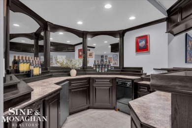 Not a single detail was spared in this sprawling custom brick on St Clair River Country Club in Michigan - for sale on GolfHomes.com, golf home, golf lot