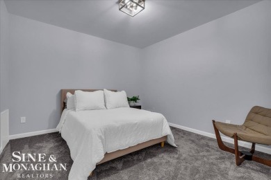 Not a single detail was spared in this sprawling custom brick on St Clair River Country Club in Michigan - for sale on GolfHomes.com, golf home, golf lot