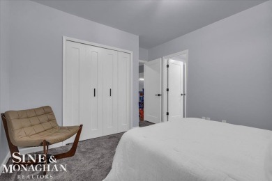 Not a single detail was spared in this sprawling custom brick on St Clair River Country Club in Michigan - for sale on GolfHomes.com, golf home, golf lot