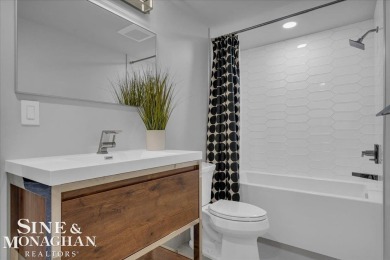 Not a single detail was spared in this sprawling custom brick on St Clair River Country Club in Michigan - for sale on GolfHomes.com, golf home, golf lot