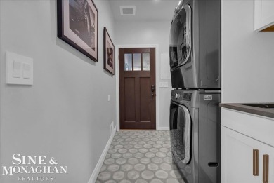 Not a single detail was spared in this sprawling custom brick on St Clair River Country Club in Michigan - for sale on GolfHomes.com, golf home, golf lot