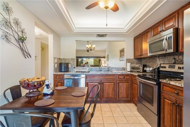 Fairway mornings await from this bright, beautifully maintained on Meadowood Golf and Tennis Club in Florida - for sale on GolfHomes.com, golf home, golf lot