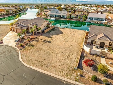 Rare opportunity to own a waterfront vacant lot in the highly on Los Lagos Golf Club in Arizona - for sale on GolfHomes.com, golf home, golf lot
