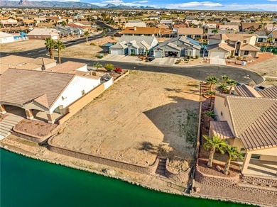 Rare opportunity to own a waterfront vacant lot in the highly on Los Lagos Golf Club in Arizona - for sale on GolfHomes.com, golf home, golf lot