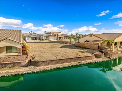Rare opportunity to own a waterfront vacant lot in the highly on Los Lagos Golf Club in Arizona - for sale on GolfHomes.com, golf home, golf lot