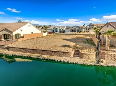 Rare opportunity to own a waterfront vacant lot in the highly on Los Lagos Golf Club in Arizona - for sale on GolfHomes.com, golf home, golf lot