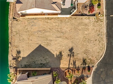 Rare opportunity to own a waterfront vacant lot in the highly on Los Lagos Golf Club in Arizona - for sale on GolfHomes.com, golf home, golf lot