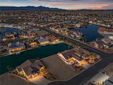 Rare opportunity to own a waterfront vacant lot in the highly on Los Lagos Golf Club in Arizona - for sale on GolfHomes.com, golf home, golf lot