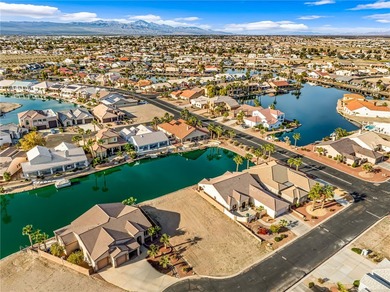 Rare opportunity to own a waterfront vacant lot in the highly on Los Lagos Golf Club in Arizona - for sale on GolfHomes.com, golf home, golf lot