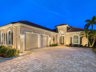 This country club, custom-built home is maintenance-free! Head on Boca Royale Golf and Country Club in Florida - for sale on GolfHomes.com, golf home, golf lot