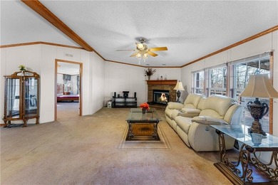 Welcome to a peaceful retreat where comfort, convenience, and on Holiday Island Executive Golf Course in Arkansas - for sale on GolfHomes.com, golf home, golf lot