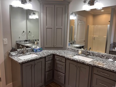 This house located in the Mystic Creek Golf Club area packs a on Mystic Creek Golf Club in Arkansas - for sale on GolfHomes.com, golf home, golf lot