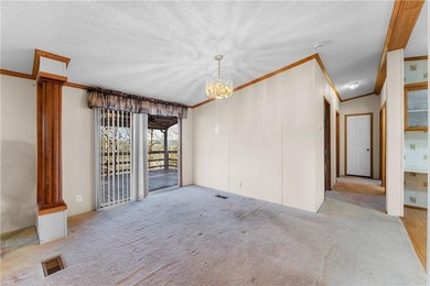 Welcome to a peaceful retreat where comfort, convenience, and on Holiday Island Executive Golf Course in Arkansas - for sale on GolfHomes.com, golf home, golf lot