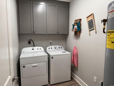 This house located in the Mystic Creek Golf Club area packs a on Mystic Creek Golf Club in Arkansas - for sale on GolfHomes.com, golf home, golf lot