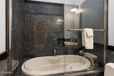 This beautiful corner unit captures the best of Gainey Ranch on Gainey Ranch Golf Club in Arizona - for sale on GolfHomes.com, golf home, golf lot