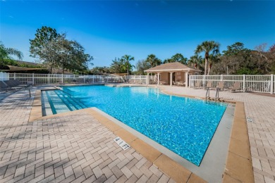 HIGH AND DRY IN OLDSMAR with NO FLOOD INSURANCE REQUIRED and NO on East Lake Woodlands Country Club in Florida - for sale on GolfHomes.com, golf home, golf lot