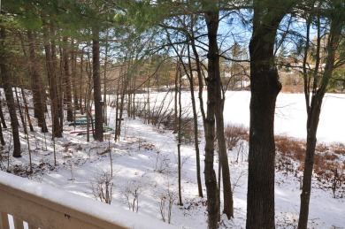 Enjoy the spectacular direct pond views from this ranch End Unit on Farmington Woods Country Club in Connecticut - for sale on GolfHomes.com, golf home, golf lot