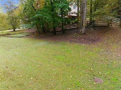 Resort-Style Living in a Premier Cherokee County Country Club on Woodmont Golf and Country Club in Georgia - for sale on GolfHomes.com, golf home, golf lot