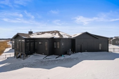 This stunning 4-bedroom ranch, plus office/den and 3 bathrooms on Bishops Bay Country Club in Wisconsin - for sale on GolfHomes.com, golf home, golf lot