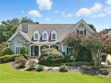 Overlooking manicured fairways and a sparkling lake, this home on The Golf Club At Bradshaw Farm in Georgia - for sale on GolfHomes.com, golf home, golf lot