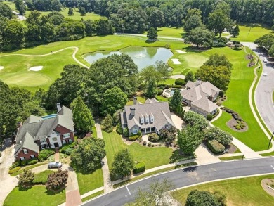 Overlooking manicured fairways and a sparkling lake, this home on The Golf Club At Bradshaw Farm in Georgia - for sale on GolfHomes.com, golf home, golf lot
