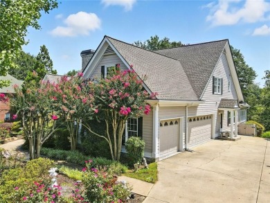 Overlooking manicured fairways and a sparkling lake, this home on The Golf Club At Bradshaw Farm in Georgia - for sale on GolfHomes.com, golf home, golf lot