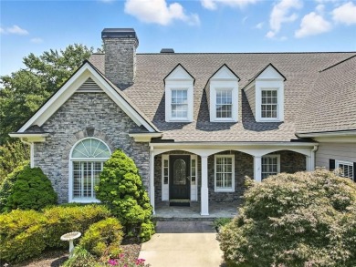 Overlooking manicured fairways and a sparkling lake, this home on The Golf Club At Bradshaw Farm in Georgia - for sale on GolfHomes.com, golf home, golf lot