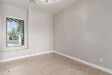 Gated community living at its best! This 4-bedroom, 2-bath home on Palm Valley Golf Club  in Arizona - for sale on GolfHomes.com, golf home, golf lot