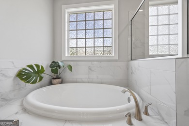 Highly motivated sellers are offering the most affordable 3-car on Traditions of Braselton Golf Club in Georgia - for sale on GolfHomes.com, golf home, golf lot