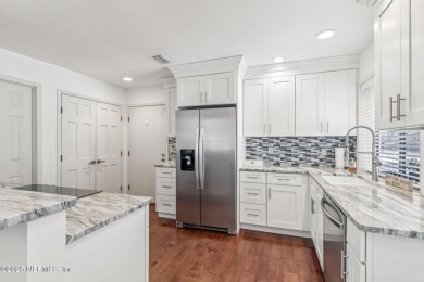 Welcome to 52 South Nine Drive - a beautifully updated home in on Sawgrass Country Club  in Florida - for sale on GolfHomes.com, golf home, golf lot