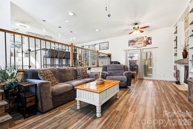 This charming split-level home offers a welcoming blend of on Tega Cay Golf Club in South Carolina - for sale on GolfHomes.com, golf home, golf lot