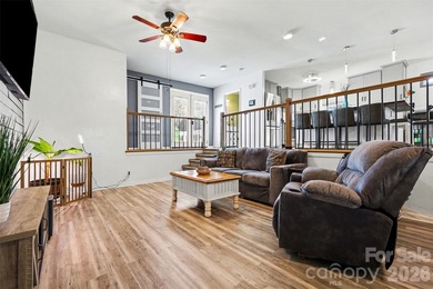 This charming split-level home offers a welcoming blend of on Tega Cay Golf Club in South Carolina - for sale on GolfHomes.com, golf home, golf lot