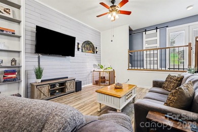 This charming split-level home offers a welcoming blend of on Tega Cay Golf Club in South Carolina - for sale on GolfHomes.com, golf home, golf lot