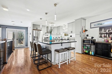 This charming split-level home offers a welcoming blend of on Tega Cay Golf Club in South Carolina - for sale on GolfHomes.com, golf home, golf lot