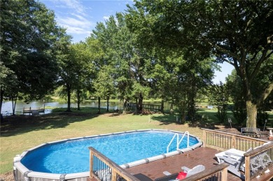 Enjoy this lakefront home in all seasons! Fish off the dock and on Vache-Grasse Country Club in Arkansas - for sale on GolfHomes.com, golf home, golf lot