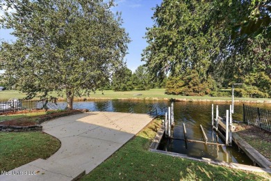 This stunning waterfront property at Lake Caroline is a rare on Lake Caroline Golf Club in Mississippi - for sale on GolfHomes.com, golf home, golf lot